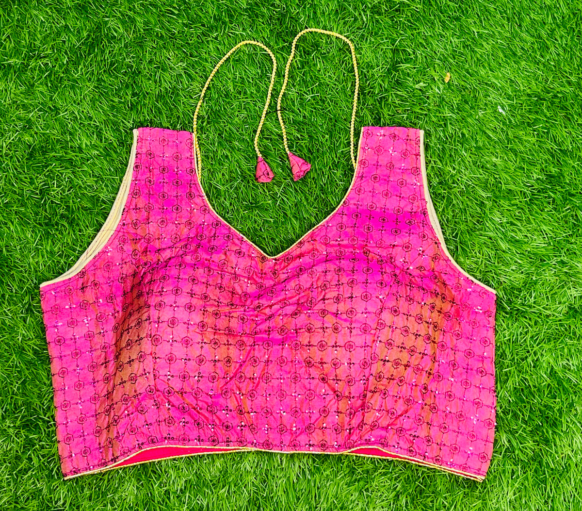 Light pink sleeveless blouse