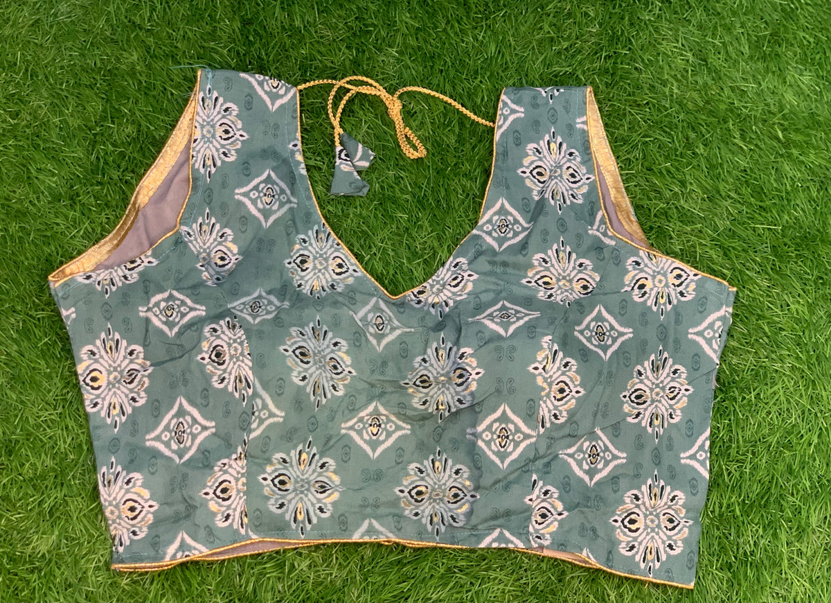 Mint colour sleeveless blouse