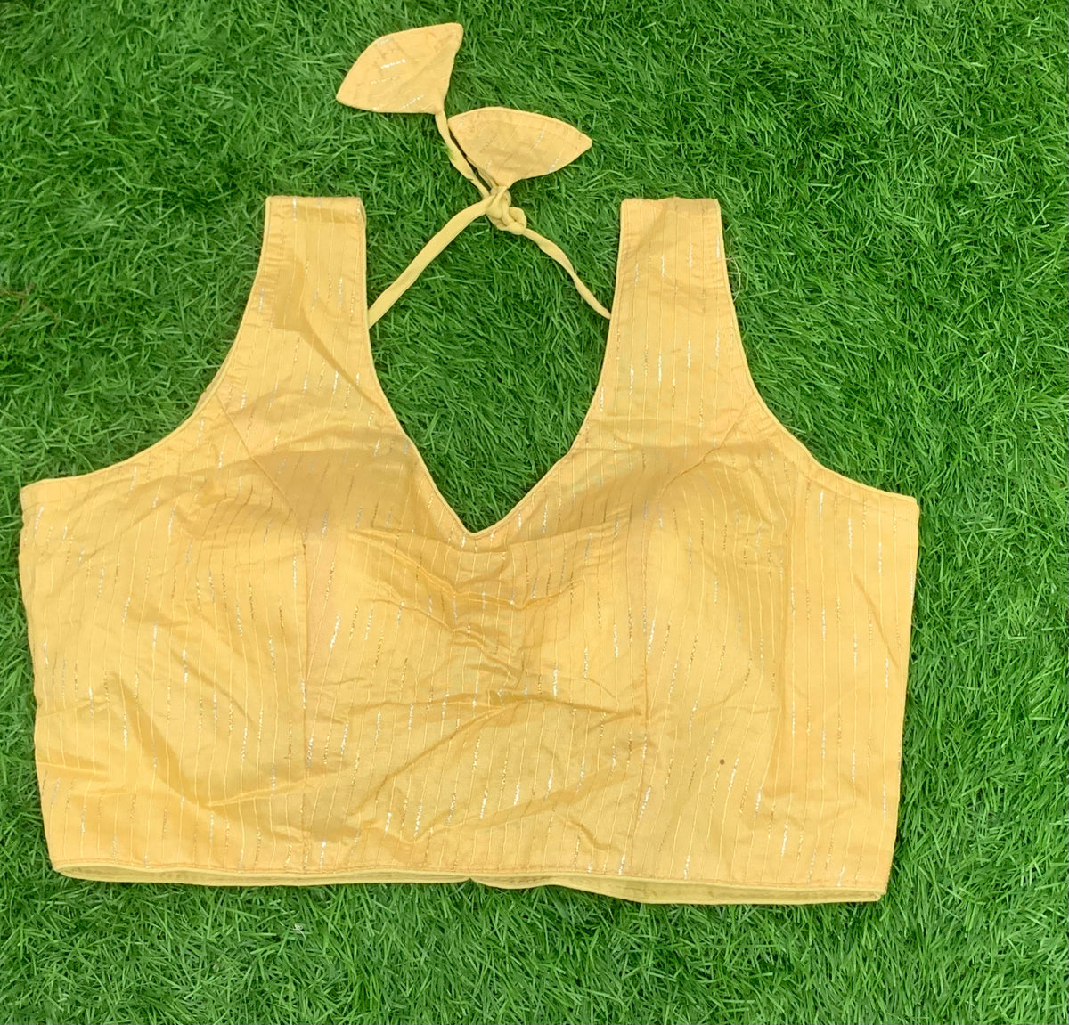 Golden blouse with hands