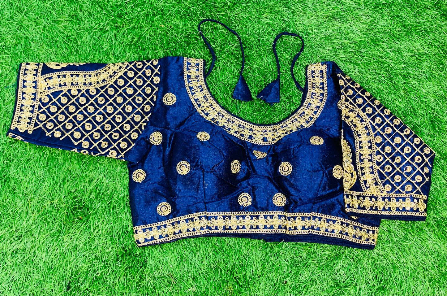 Navy blue hands on Moti work