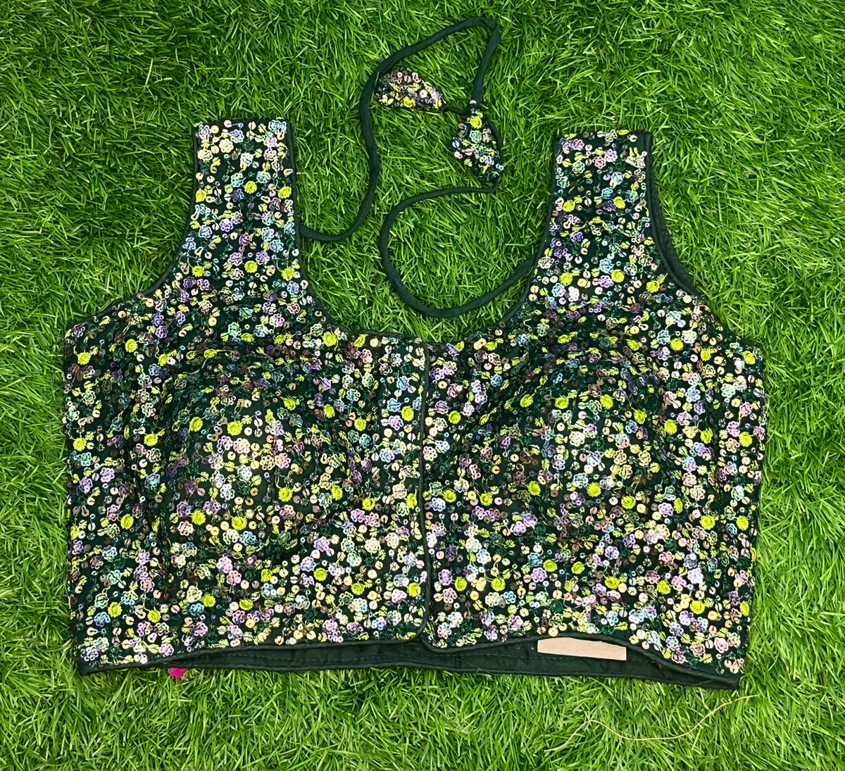 Sleeveless green blouse