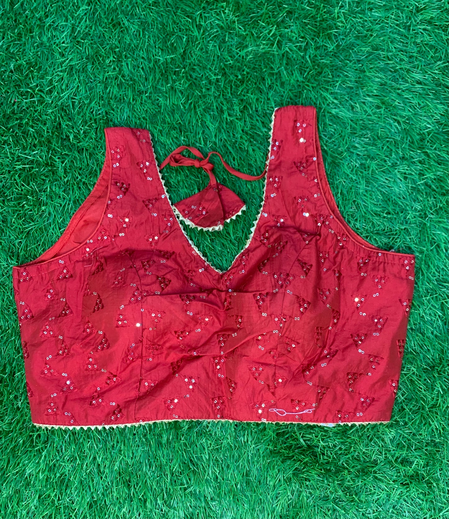 Red sequence with temple lace blouse